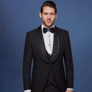 A black tuxedo suit with a satin lapel.