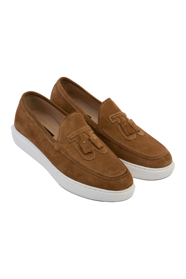A pair of leather loafers for men, showcasing intricate detailing and craftsmanship.